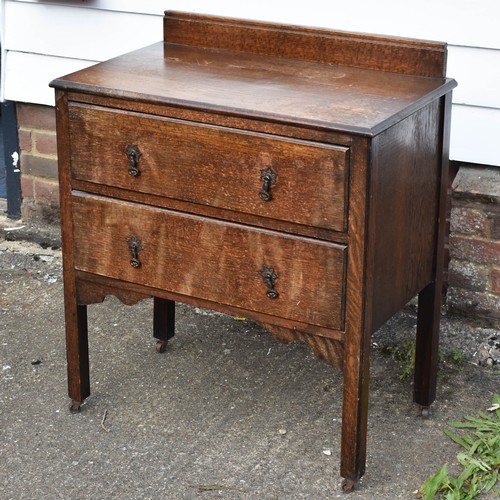 103 - A Vintage Two Drawer Chest Of Drawers On Wheels Featuring Delightful Metal Handles