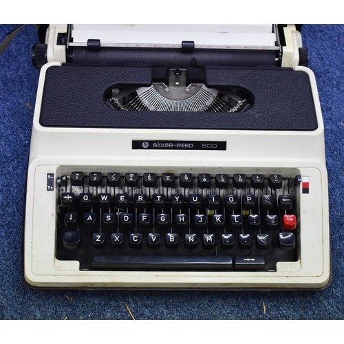 217 - A Vintage Silver Reed 500 Type Writer In Case