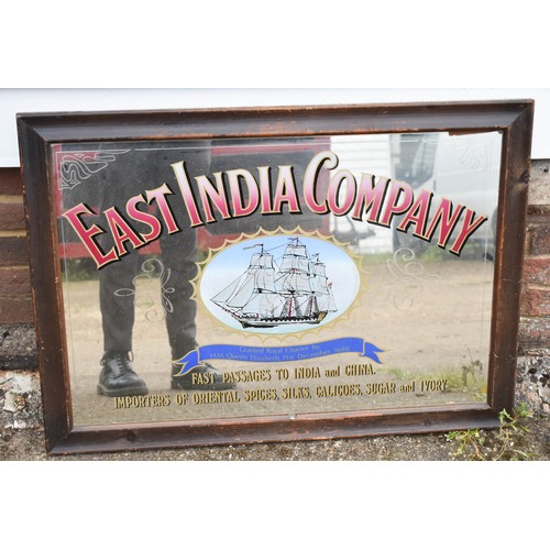 269 - A Large Decorative Pub Advertising Mirror Titled East India Company. 88cm x 63cm (A/F)