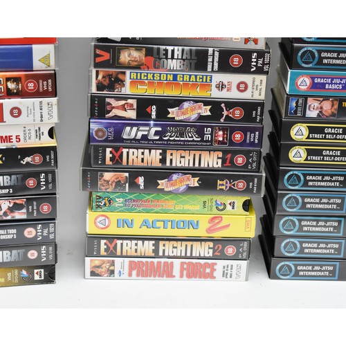 193 - A Large Collection Of Vintage 1990's VHS Tapes Including Wrestling, Boxing, And Martial Arts Instruc... 