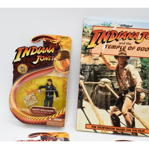 461 - A Collection Of Indiana Jones Boxed Figurines Plus A Book