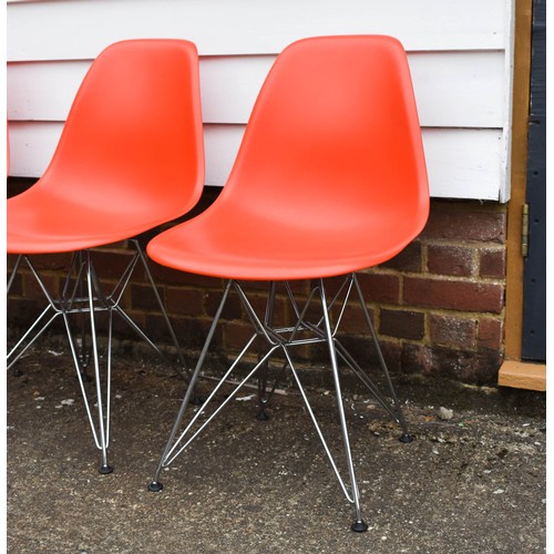 210 - A Collection Of 4 Blood Orange Eames Vitra Chairs Complete With Labels. Eiffel Legs.