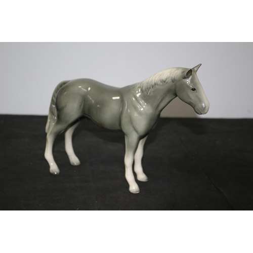 107 - A Beswick Tall Grey Horse 20.5cm tall