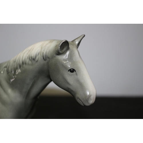 107 - A Beswick Tall Grey Horse 20.5cm tall