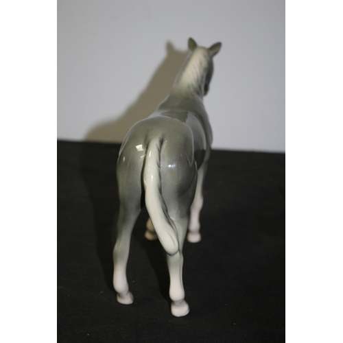 107 - A Beswick Tall Grey Horse 20.5cm tall