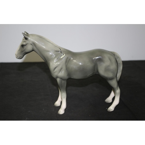 107 - A Beswick Tall Grey Horse 20.5cm tall