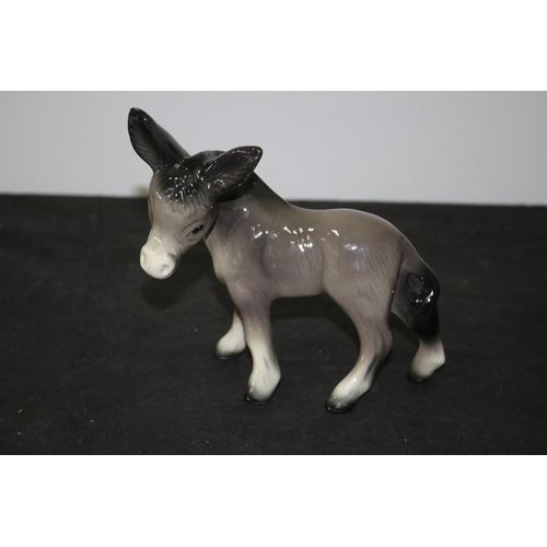 110 - Believed to be a Beswick Donkey 17cm tall