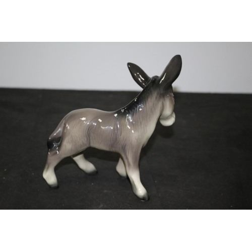 110 - Believed to be a Beswick Donkey 17cm tall