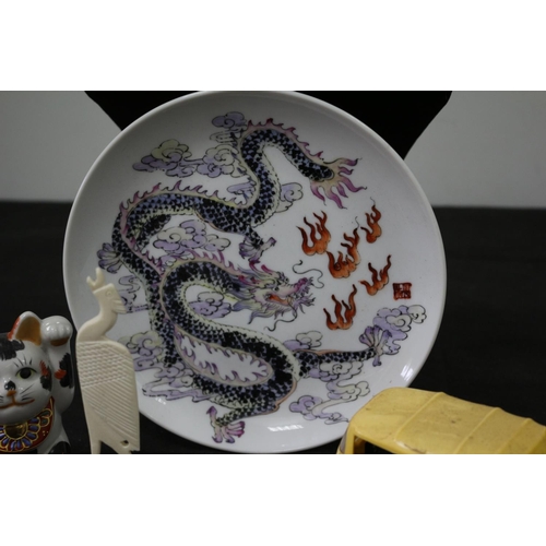 146 - An Assortment of Oriental Items Including a Believed to be an Aged Ivory Bird, Dragon Plate, Good Lu... 