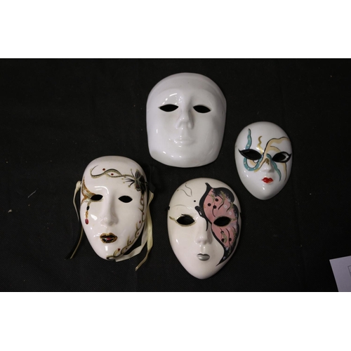 304 - Collection of 4 Porcelain Hand Painted Venetian Carnival Masks