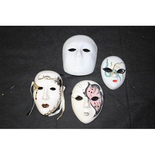 304 - Collection of 4 Porcelain Hand Painted Venetian Carnival Masks