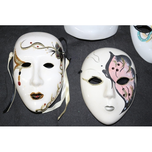 304 - Collection of 4 Porcelain Hand Painted Venetian Carnival Masks