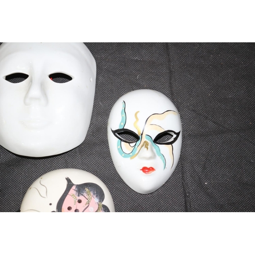 304 - Collection of 4 Porcelain Hand Painted Venetian Carnival Masks