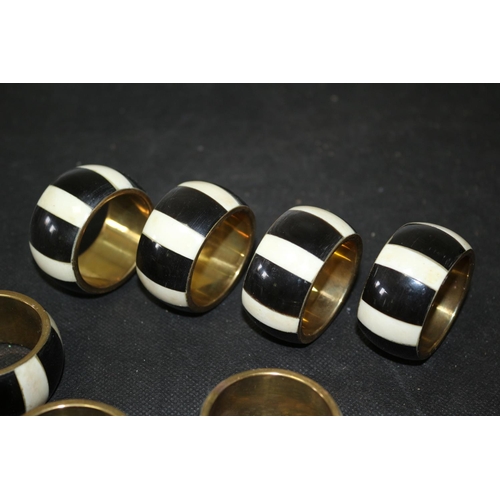 306 - Set of 8 Napkin Rings Brass and Believed to be Ebony and Ivory Inlay