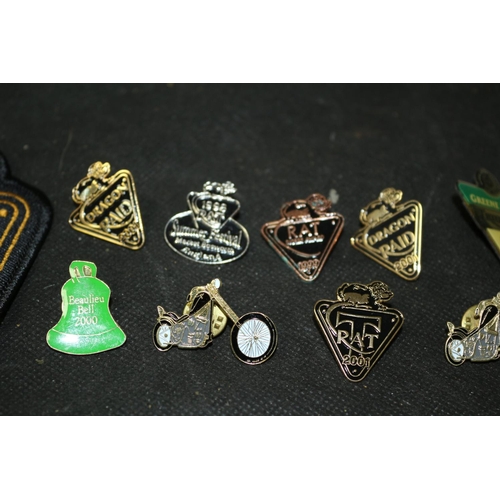 336 - A Quantity of Triumph Badges and Others