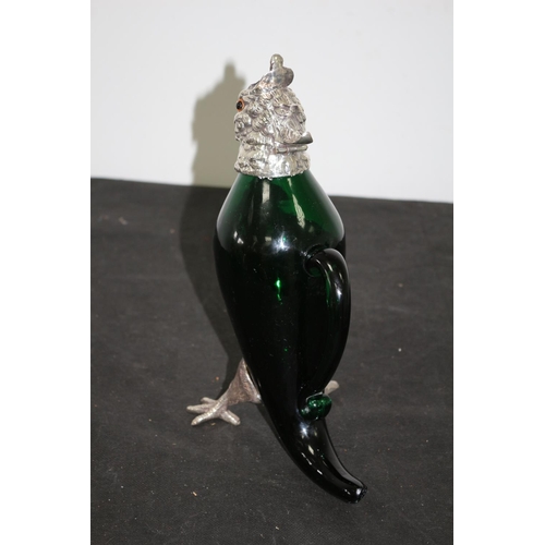 44 - A silver Plated Eagle Head Heavy Green Blown Glass Decanter Standing 28cm Tall. Legs Have been re Gl... 