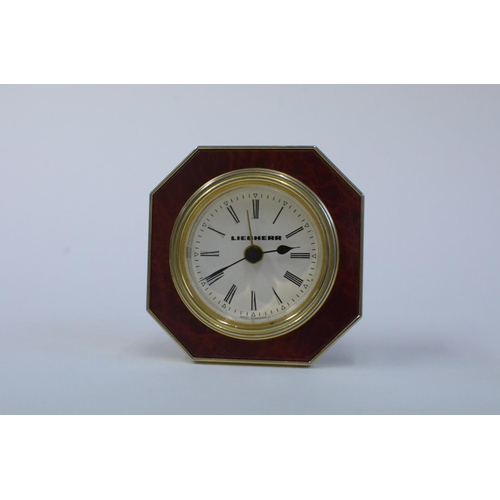 61 - A Collection of Brass Miniature Clocks