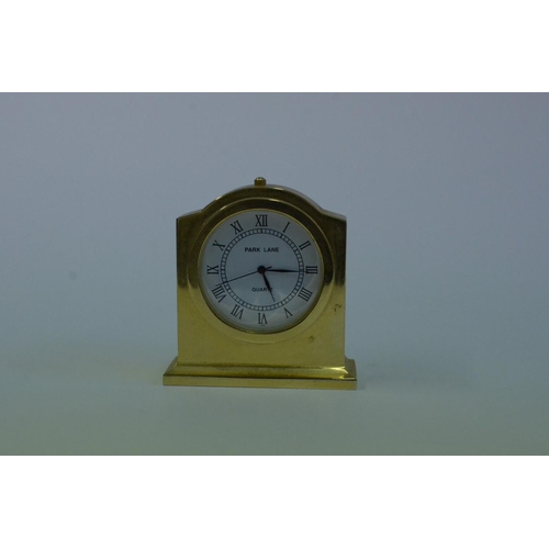 61 - A Collection of Brass Miniature Clocks