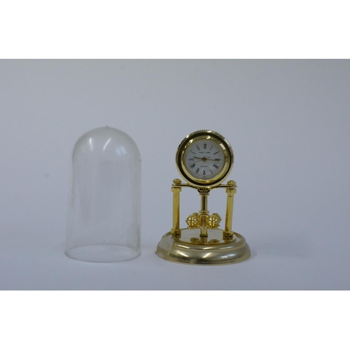 61 - A Collection of Brass Miniature Clocks