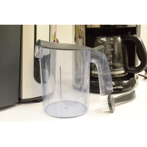 115 - Russell Hobbs Coffee Torino and a Phillips Juicer untested