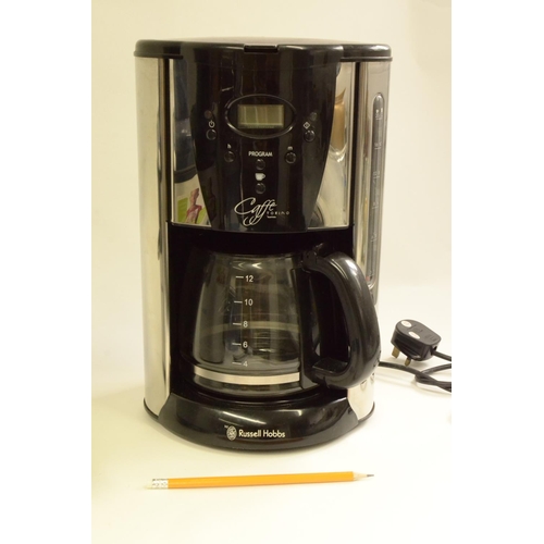 115 - Russell Hobbs Coffee Torino and a Phillips Juicer untested