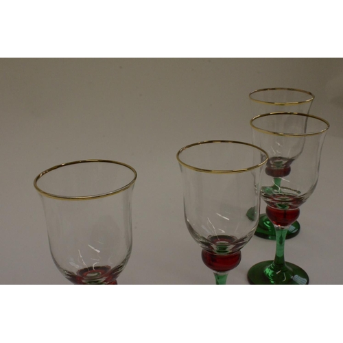 145 - 4 x Green Stem Glasses with Red Bulb and Gold Trim Top