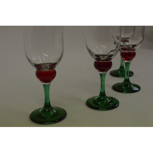 145 - 4 x Green Stem Glasses with Red Bulb and Gold Trim Top