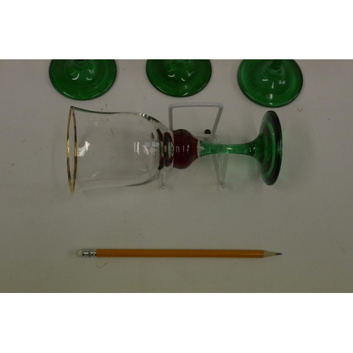 145 - 4 x Green Stem Glasses with Red Bulb and Gold Trim Top