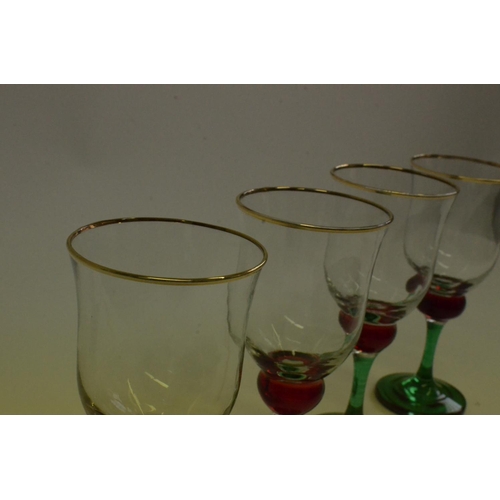 145 - 4 x Green Stem Glasses with Red Bulb and Gold Trim Top