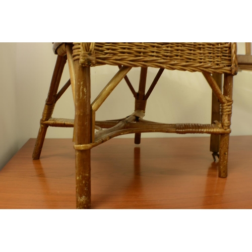 574 - 1 x Wooden Doll Cradle 54x58x34cm
1 x Childs Wicker Chair 49x38cm