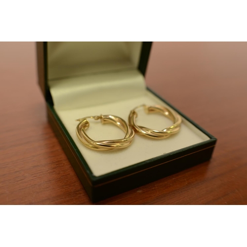 605 - Pair of 9ct Gold earrings 2cm