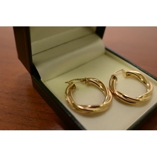 605 - Pair of 9ct Gold earrings 2cm