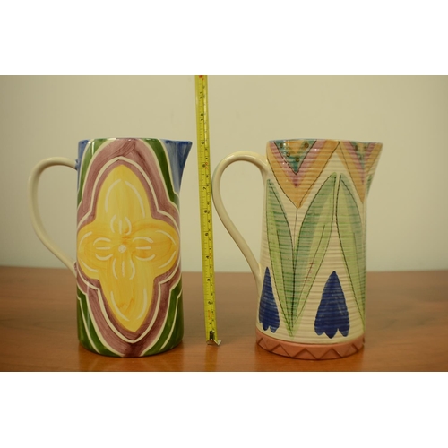 659 - 2 Decorative Pitchers