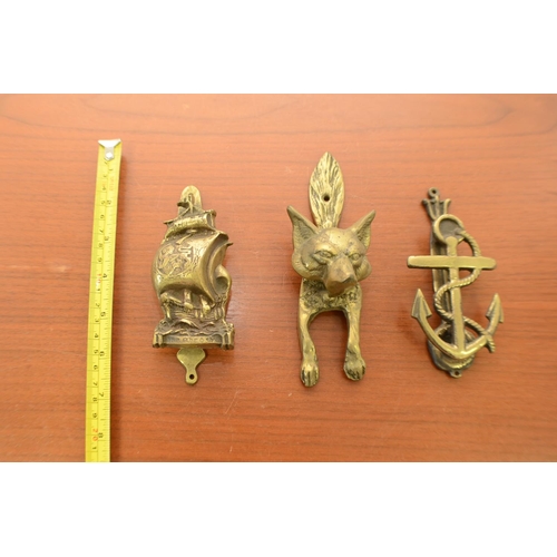 835 - A selection of Brass Door Knockers with Different themes