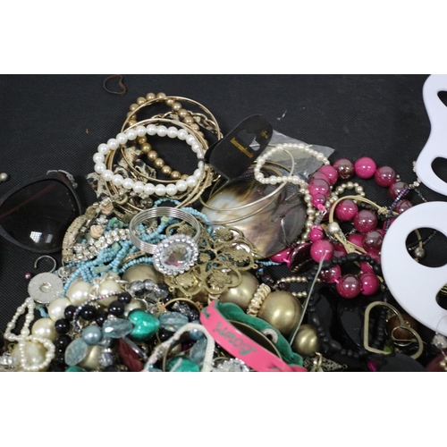 219 - A Bag of Costume Jewellery