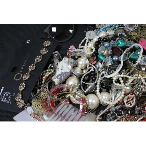 219 - A Bag of Costume Jewellery