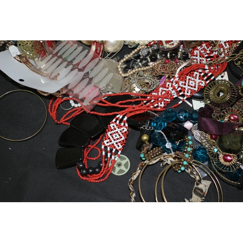 219 - A Bag of Costume Jewellery