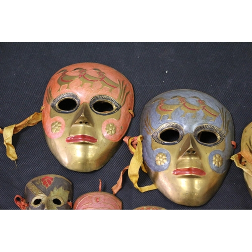 255 - A Selection of Brass Enameled venetian Mask