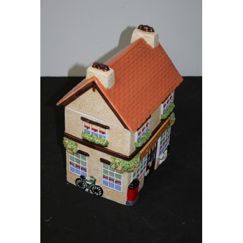 314 - Ceramic Village post Office Biscuit Barrell