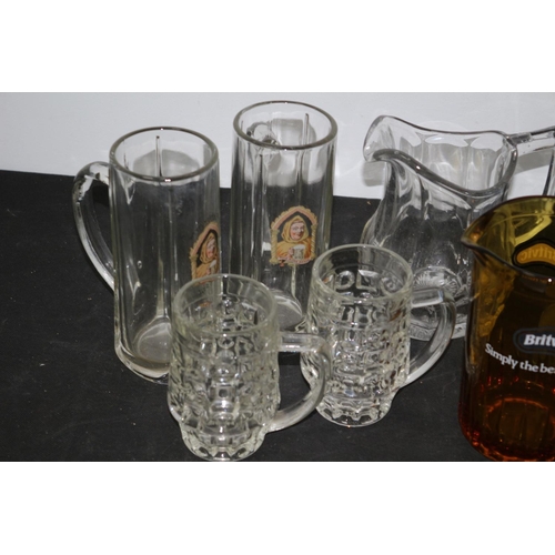 316 - Collection of Glasses and Pitchers including Britvic