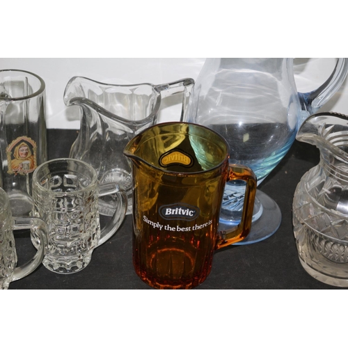 316 - Collection of Glasses and Pitchers including Britvic