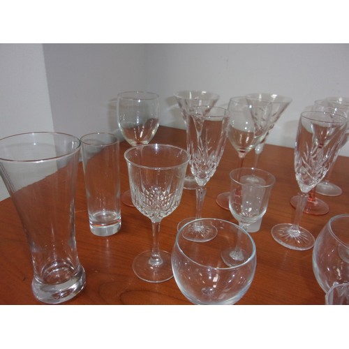 45 - A Large Selection of Glasses Including Wine, Shot Glasses and Lots More