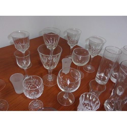 45 - A Large Selection of Glasses Including Wine, Shot Glasses and Lots More