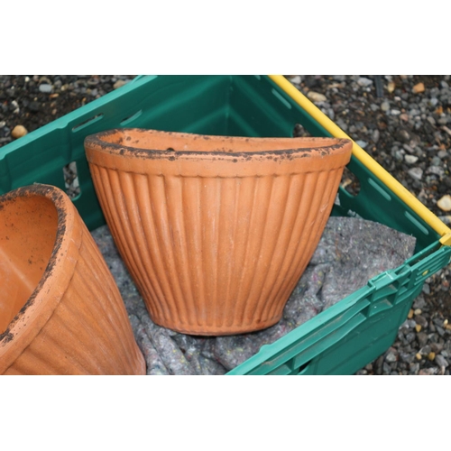 680 - 2 x Terracotta Wall Planters