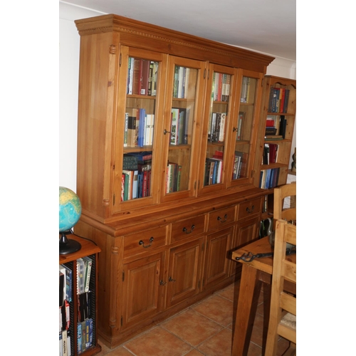 712 - Antique Effect Pine Wall Unit with 4 Glass Doors and 4 Cupboards with Drawers and Keys, Contents Not... 