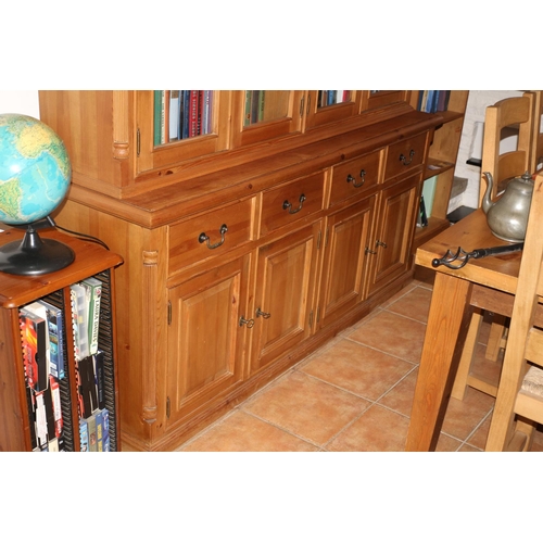 712 - Antique Effect Pine Wall Unit with 4 Glass Doors and 4 Cupboards with Drawers and Keys, Contents Not... 