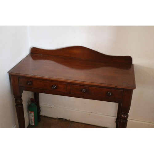 733 - Antique Mahogany 2 Drawer Lady's Writing Table with Serpentine Back - Beautiful example