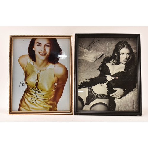 128 - Two Framed Photographs Of Elizabeth Hurley - One With Signature