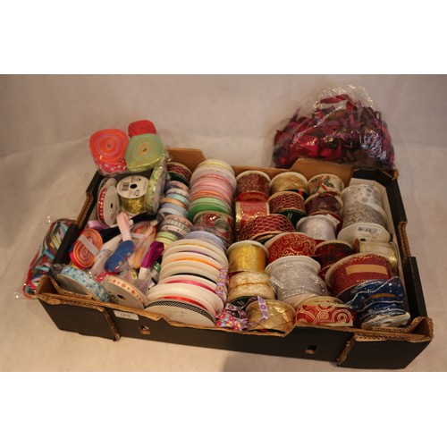 129 - A Box Containing A Large Quantity Of Mainly New Ribbon Of Various Sizes And Patterns, Still on Reels... 