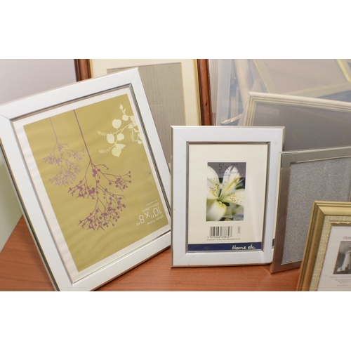 294 - A Large Selection of Photo Frames all Different sizes and styles